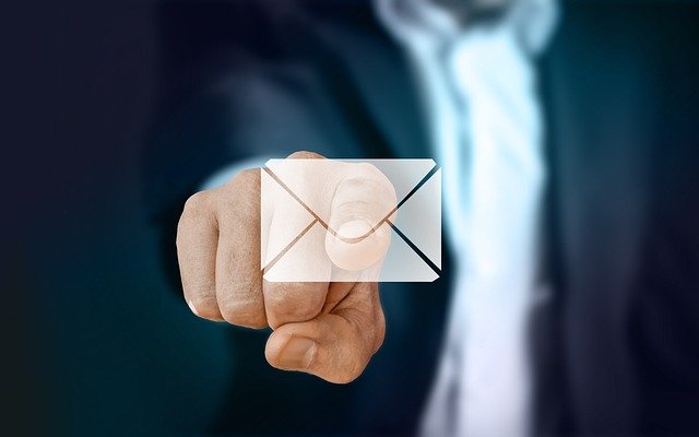 Man touching an email icon