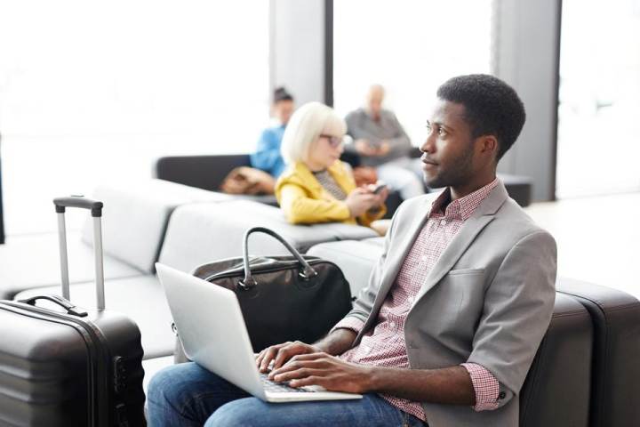 A man in the airport waiting area