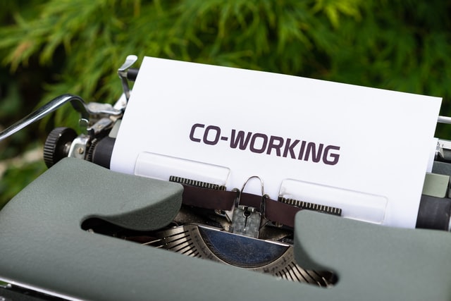 Old fashion typewriter and a piece papar that says Coworking