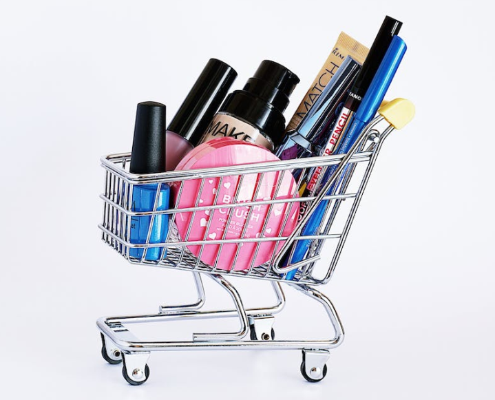 Shopping cart with makeup products in it