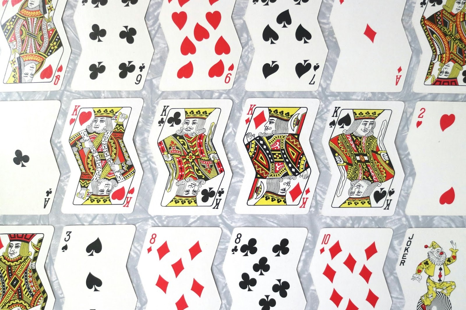 Should You Play Your Favorite Card Game Online or Stick to a Deck of Cards?
